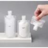 my-11134207-7qul0-lh491e2nig3ab2.webp Portable Travel Lotion Dispenser Bag – Transparent Cosmetic & Shampoo Bottle (30/50/100ml)