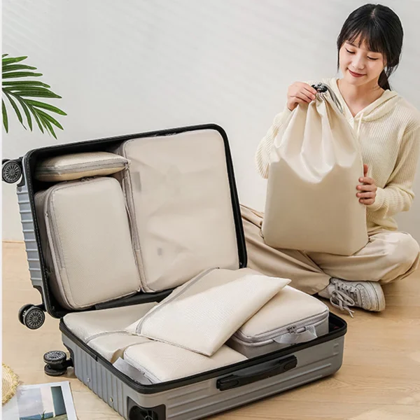 sg-11134201-8258k-mg22ozk0wb2m6b.webp Compressible Packing Travel Storage Bag Cubes – Waterproof Nylon Luggage Organizer